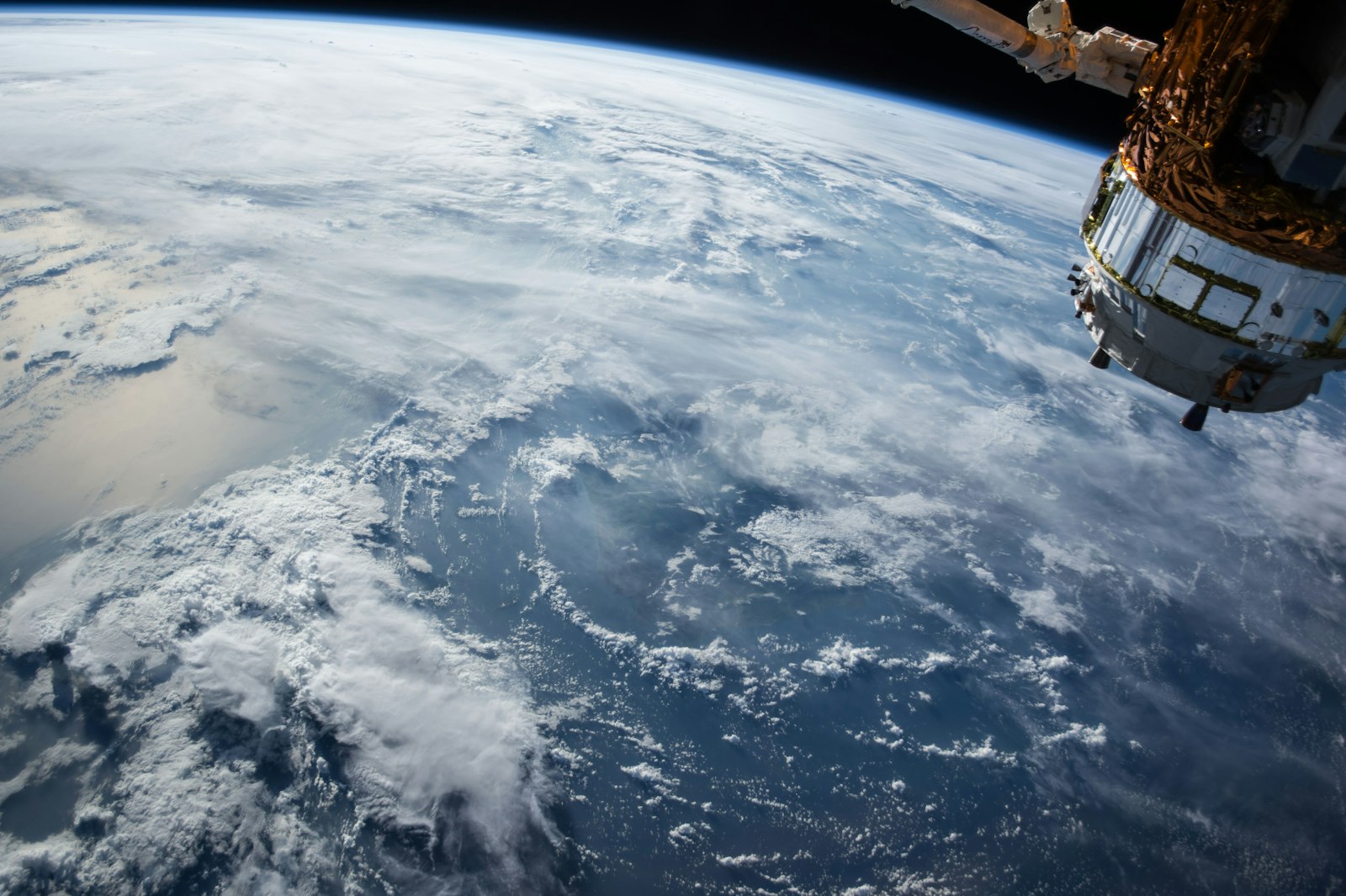 Satellite orbiting above Earth, photographed from space